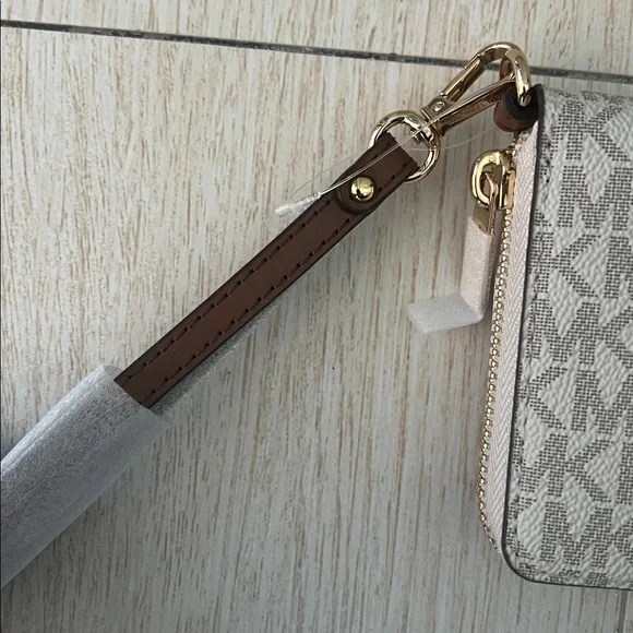 Brand new never used Michael Kors Monogram Wristlet in Cream and Gray - Picture 2 of 8